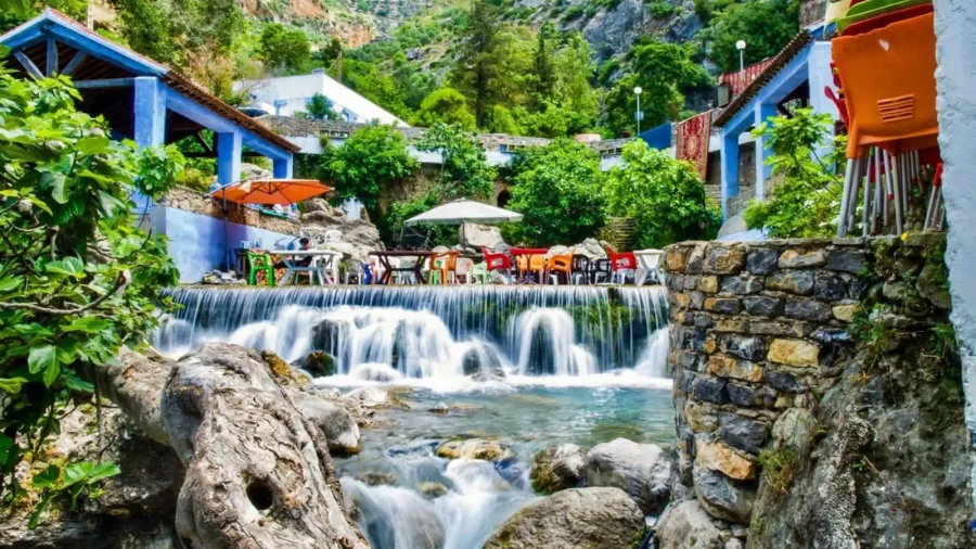 Flowing mountain water and blue riverside cafe at Ras El Maa in Chefchaouen