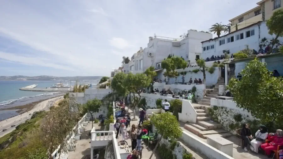 White terraced seating and sea views at Cafe Hafa in Tangier